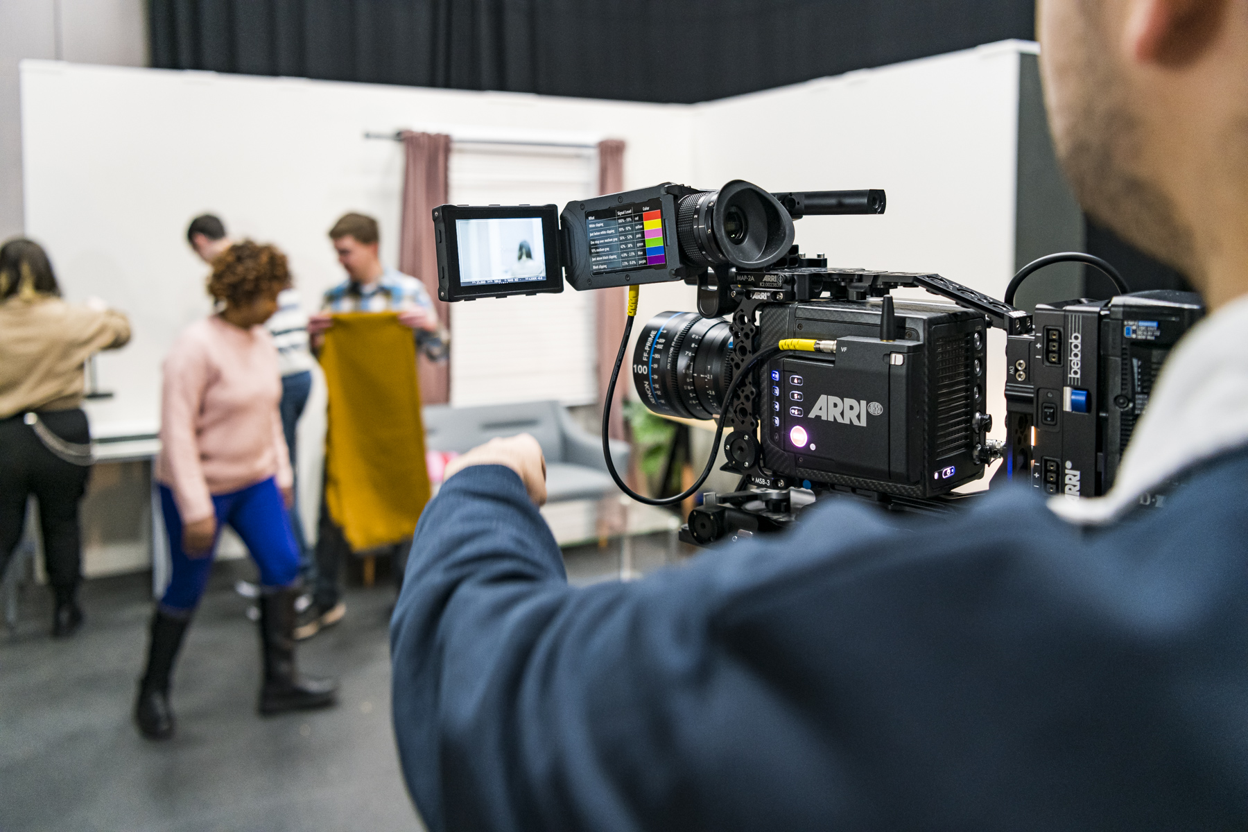 Students working in film studio